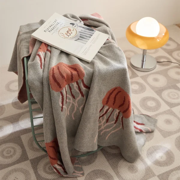 REGINA Kawaii Jellyfish Pattern Blanket Delicate Texture Decorative Cotton Knitted Blankets Cute Car Picnic Outdoor Bed 2 Step into playful enchantment with Kawaii Jellyfish Pattern Cotton Knitted Blanket. Featuring a charming jellyfish design and made from high-quality cotton.