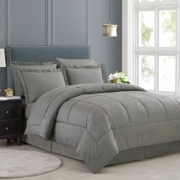 2 3pcs Fashion Luxury Comforter Pillowcases Set Grey Stain Stripe Quilted All Seasons Bedding Soft Warm 1 Upgrade your bedding with our Fashion Luxury Comforter Set in Grey Stripe Quilted design. Perfect for all seasons, this set offers soft warmth and skin-friendly comfort for a restful night's sleep. Elevate your bedding effortlessly.