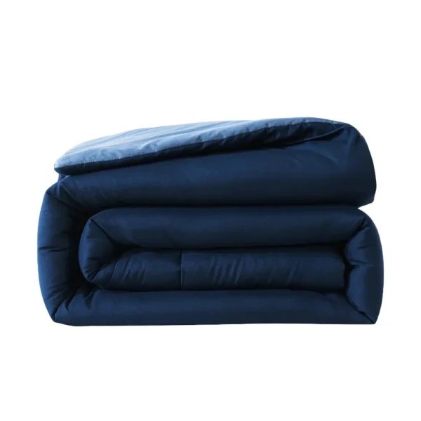 Reversible Microfiber Comforter Navy Twin Twin XL Adult Unisex 2 Experience versatility with our Reversible Microfiber Comforter in Navy. Perfect for adults of any gender, this twin/twin XL comforter offers both style and functionality. Elevate your sleep space effortlessly.