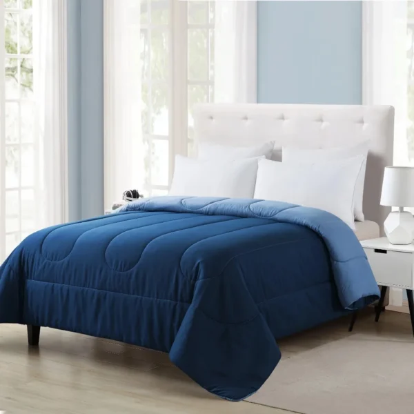 Reversible Microfiber Comforter Navy Twin Twin XL Adult Unisex 3 Experience versatility with our Reversible Microfiber Comforter in Navy. Perfect for adults of any gender, this twin/twin XL comforter offers both style and functionality. Elevate your sleep space effortlessly.