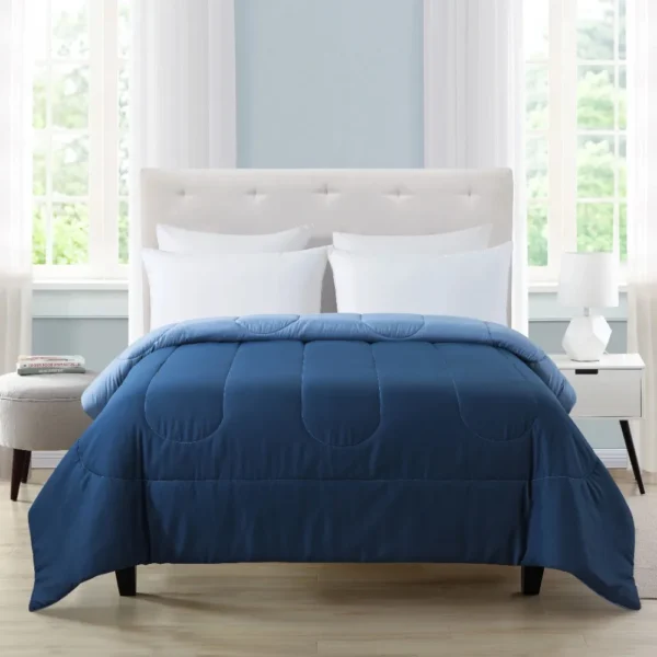 Reversible Microfiber Comforter Navy Twin Twin XL Adult Experience versatility with our Reversible Microfiber Comforter in Navy. Perfect for adults of any gender, this twin/twin XL comforter offers both style and functionality. Elevate your sleep space effortlessly.